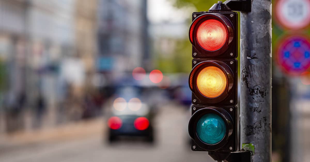 Defective traffic light on city street. | Colling Gilbert Wright