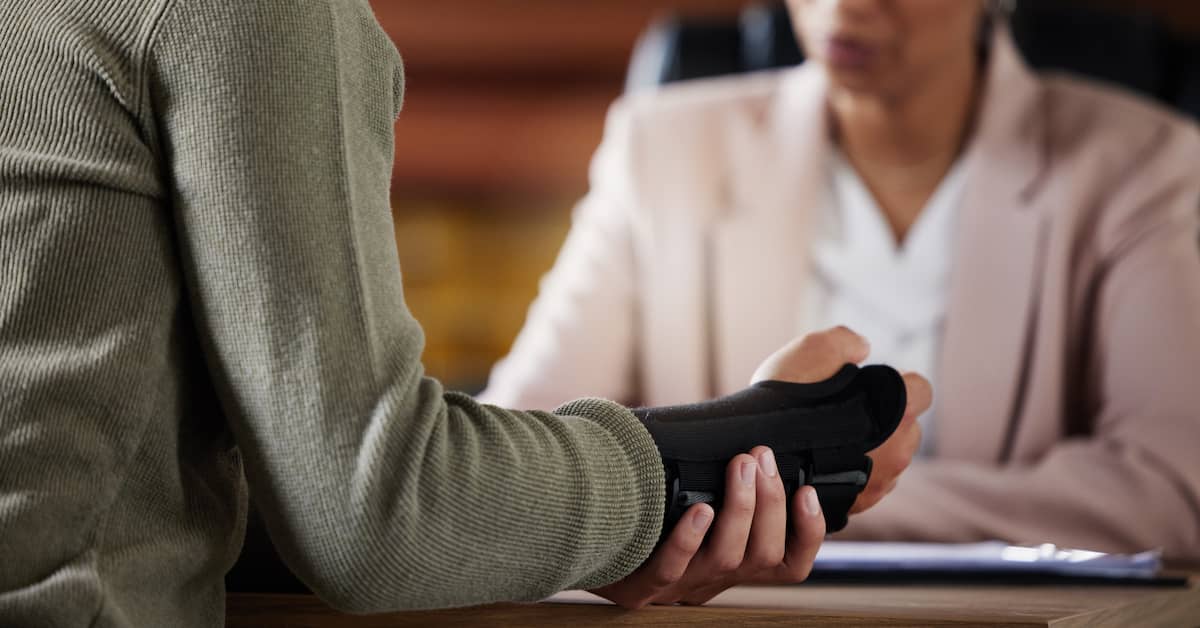 Injured worker meets with lawyer. | Colling Gilbert Wright