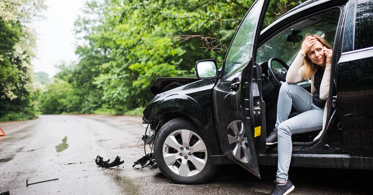 an injured woman calls a car accident lawyer | Colling, Gilbert, Wright and Carter