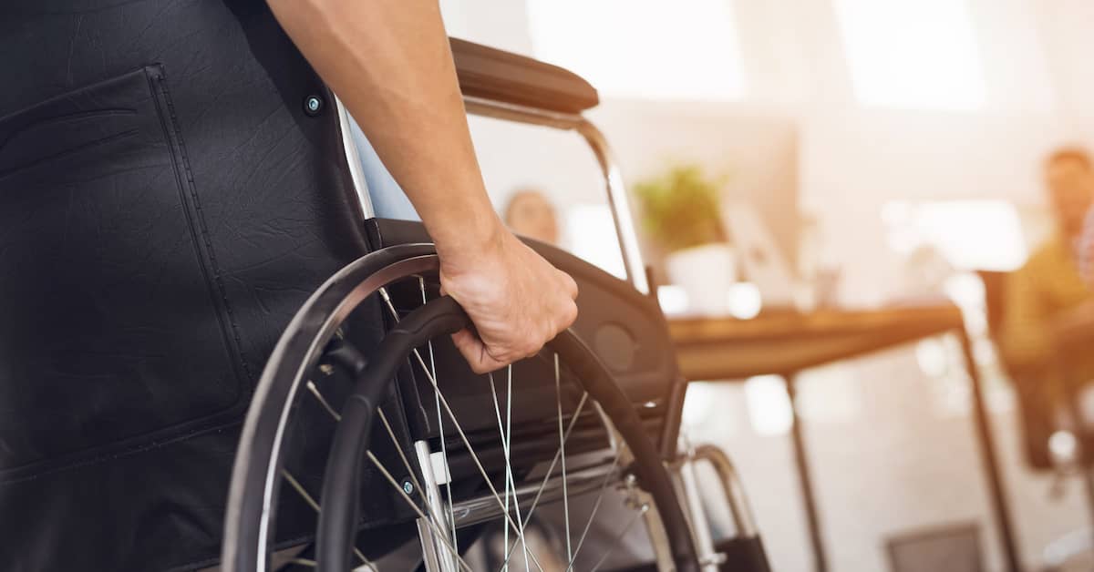 a man in a wheelchair after a car accident | Colling Gilbert Wright