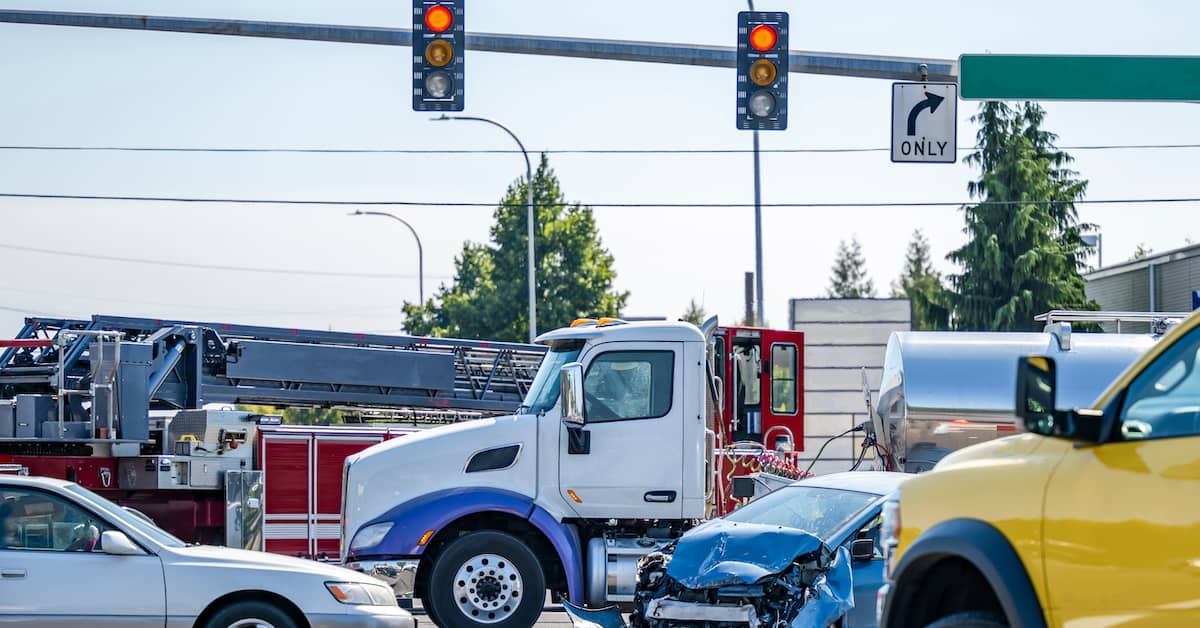 Truck and cars crashed in an intersection. | Colling Gilbert Wright